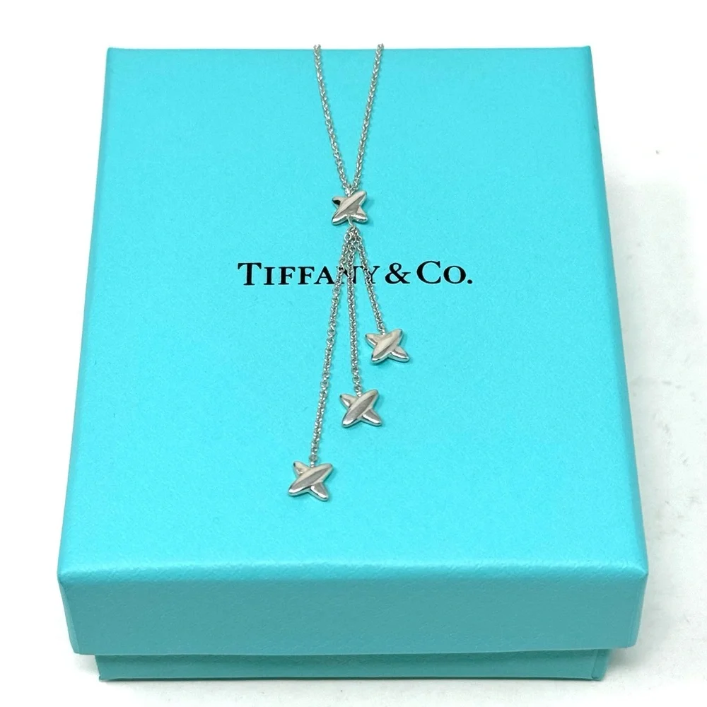 Authentic Tiffany & co. Triple X Kiss Cross Drope Necklace.